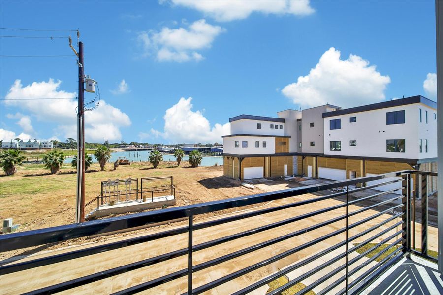 Exterior details and patio area of a home in Lago Pointe, Seabrook (Image 24).