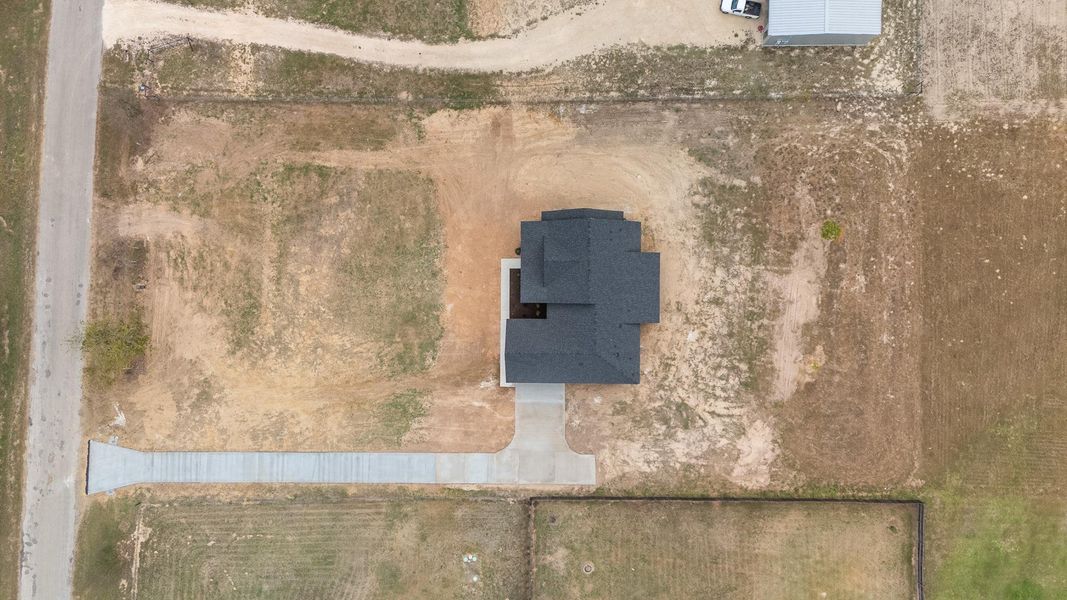 Site preparation for new homesites in , McDade (Image 24).