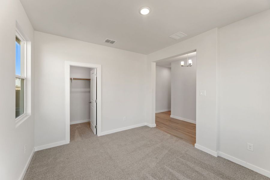 Representative unfurnished interior of a home built from the Poinseta by Hakes Brothers in Hickory Ridge, Elmendorf (Image 19). Representative unfurnished interior of a home built from the Poinseta by Hakes Brothers in Hickory Ridge, Elmendorf (Image 19).