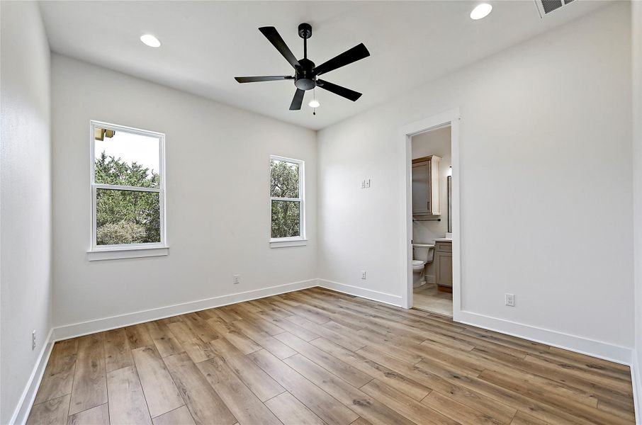 Secondary bedrooms all feature vinyl plank flooring and some have their own private full bath.