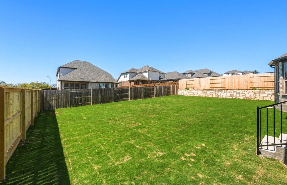 Exterior details and patio area of a home in Crescent Bluff, Georgetown (Image 21).