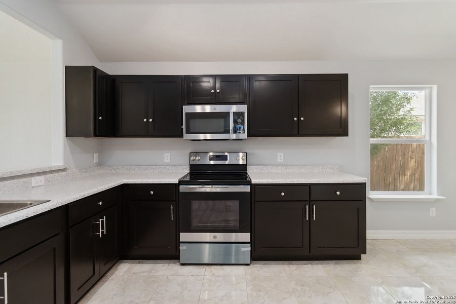 Furnished interior view inside a new home in , San Antonio (Image 8).