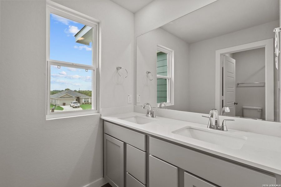 Furnished interior view inside a new home in Cinco Lakes, San Antonio (Image 8).