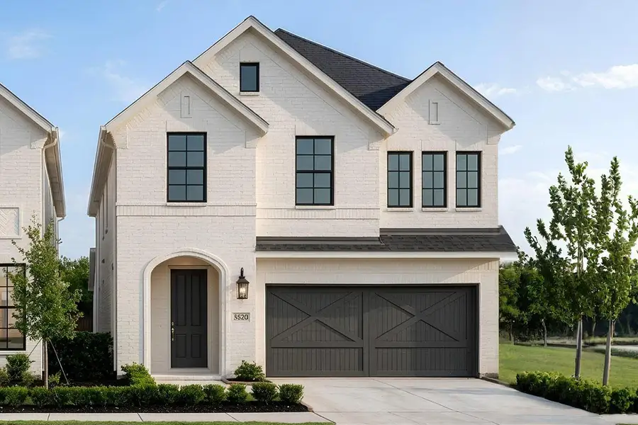 Representative exterior photo of a completed home built from the Royal Willow by Grand Homes in Trails at Cottonwood Creek, Rowlett, TX (Image 2). Representative exterior photo of a completed home built from the Royal Willow by Grand Homes in Trails at Cottonwood Creek, Rowlett, TX (Image 2).