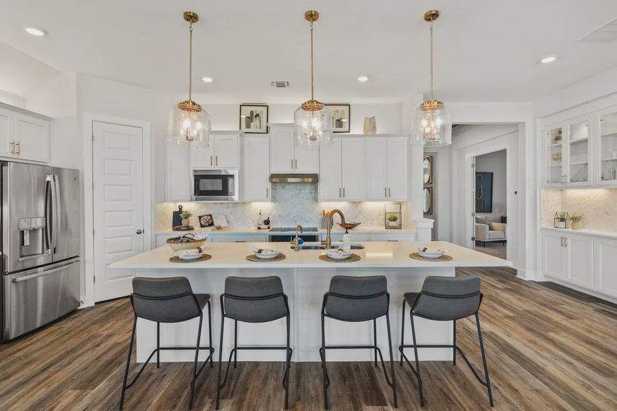 Representative furnished interior of a home built from the Mia by Chesmar Homes in Sweetwater, Austin (Image 4).