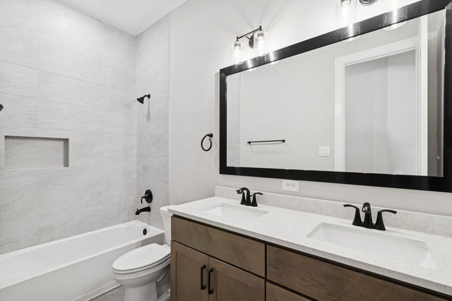 Furnished interior view inside a new home in The Meadows at Imperial Oaks, Conroe (Image 9).