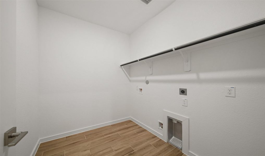 Laundry room (*Photo not of actual home and used for illustration purposes only.)