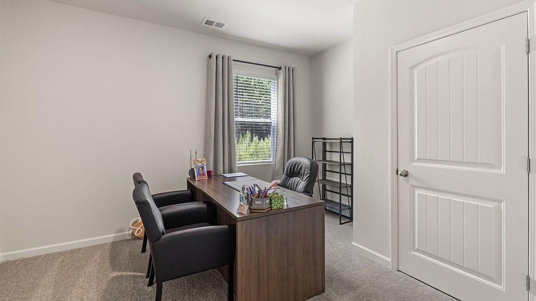 Representative furnished interior of a home built from the ROBIE by D.R. Horton in Pointe Park, Union City (Image 17).