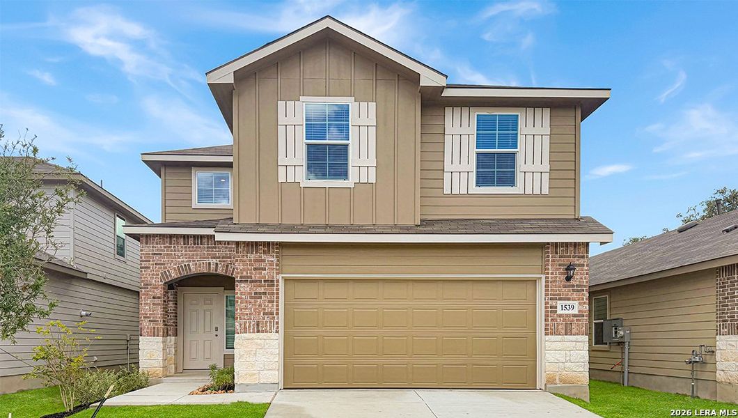 Front exterior of a new home in Veranda, San Antonio, TX, highlighting curb appeal (Image 1). Front exterior of a new home in Veranda, San Antonio, TX, highlighting curb appeal (Image 1).
