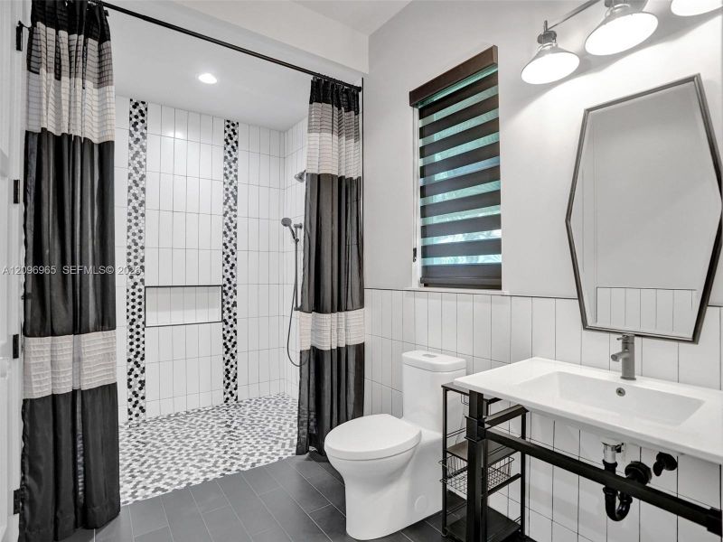Furnished interior view inside a new home in , Hobe Sound (Image 55).