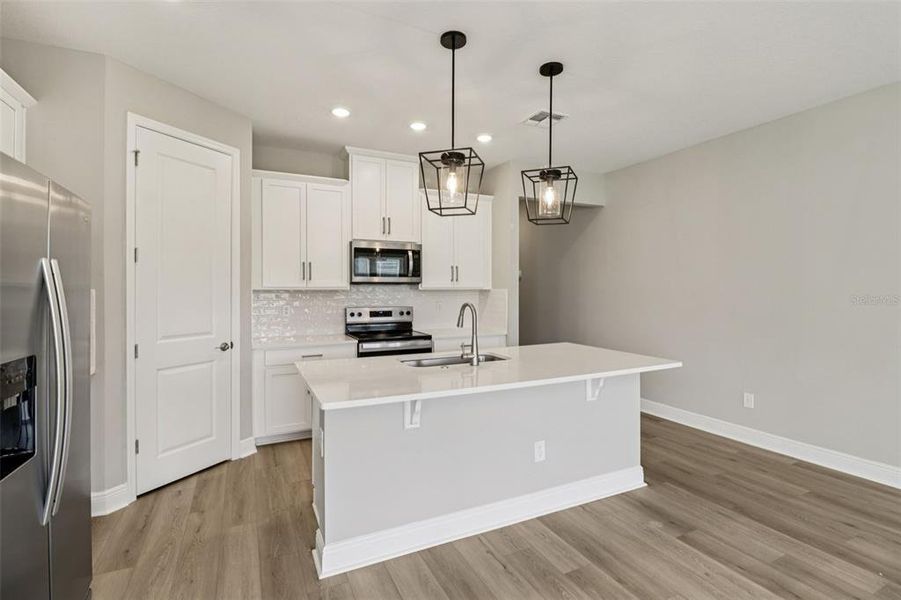 Furnished interior view inside a new home in Legends Preserve - Signature Series, Daytona Beach (Image 7).