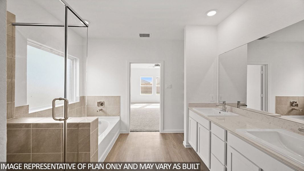 Furnished interior view inside a new home in Sunterra, Katy (Image 9).