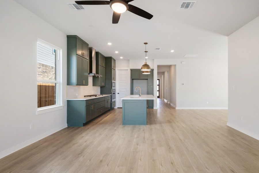 Furnished interior view inside a new home in Heritage, Dripping Springs (Image 5).