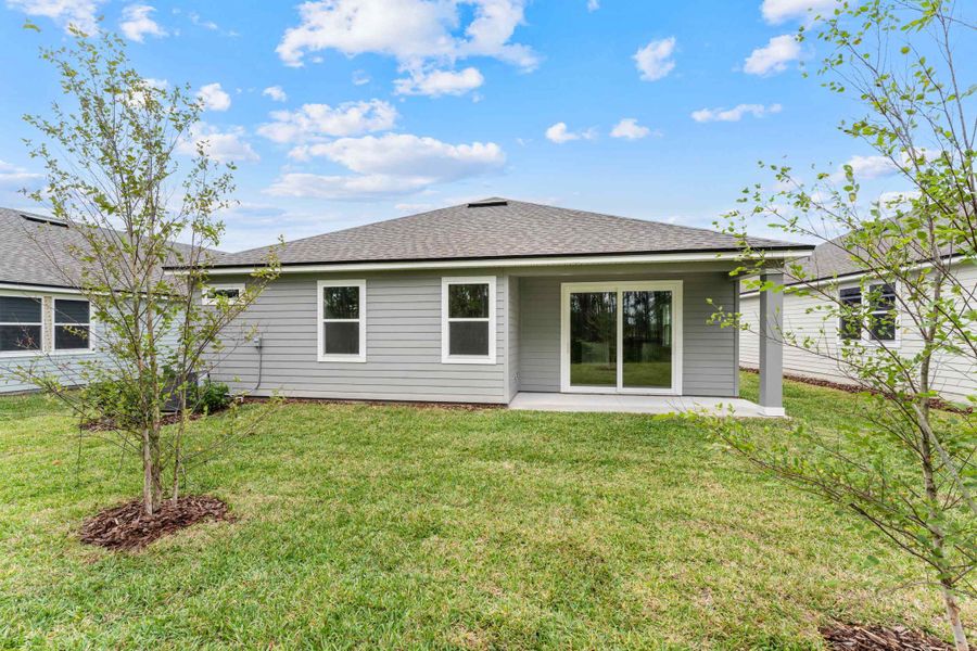 Lot 216 Rear Exterior with Covered Patio at Reserve East in Flagler Beach Lot 216 Rear Exterior with Covered Patio at Reserve East in Flagler Beach