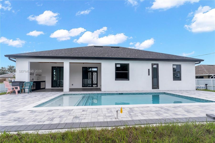Exterior details and patio area of a home in , Cape Coral (Image 32).