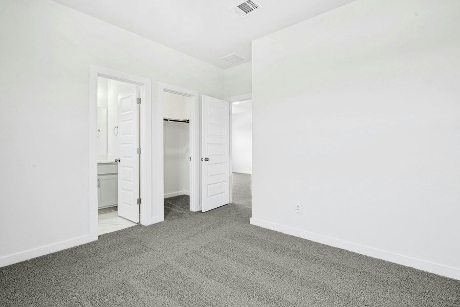 Spacious, unfurnished interior of a new home in The Colony, Bastrop (Image 32). Spacious, unfurnished interior of a new home in The Colony, Bastrop (Image 32).
