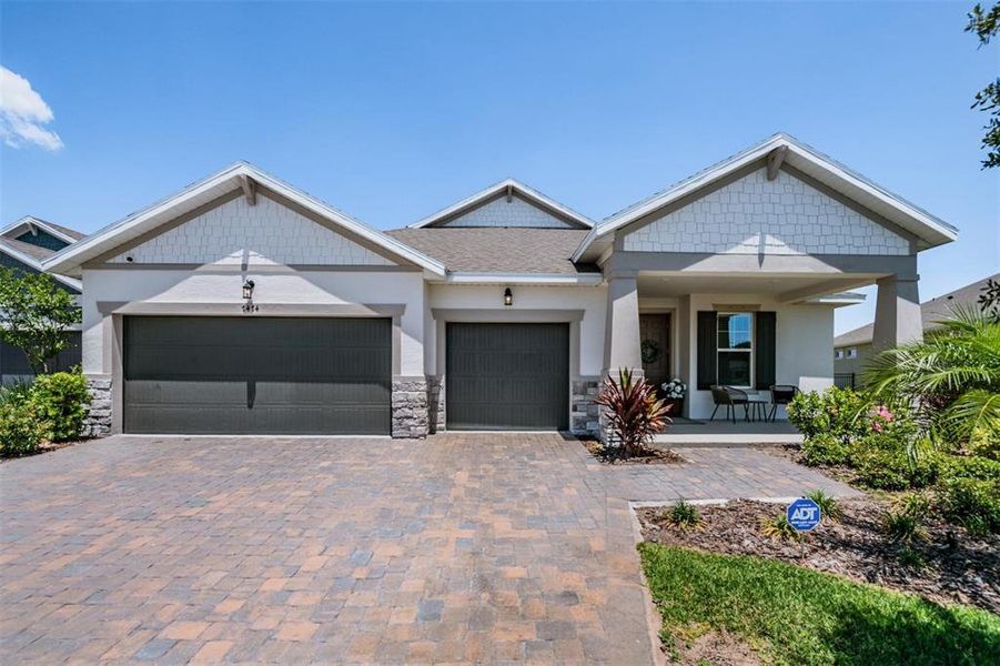 Front exterior of a new home in , Parrish, FL, highlighting curb appeal (Image 23).