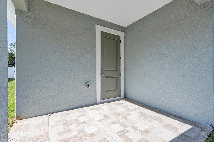 Exterior details and patio area of a home in , Summerfield (Image 24).