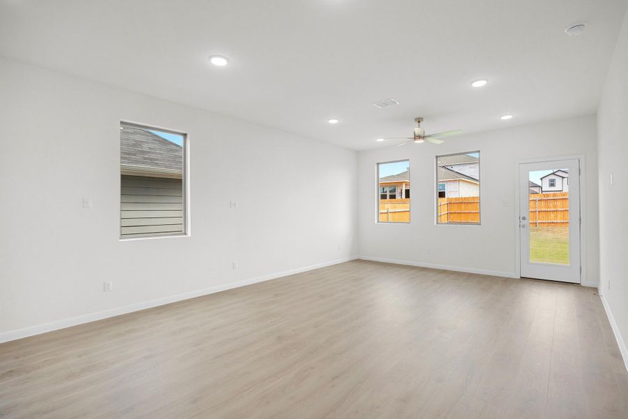 Living Room in the Magnolia home plan by Trophy Signature Homes – REPRESENTATIVE PHOTO