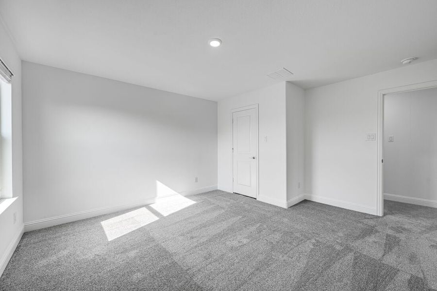 Representative unfurnished interior of a home built from the Lunaria by Taylor Morrison in Madero 50s, Fort Worth (Image 26).