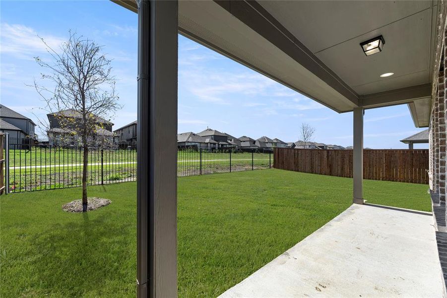 Exterior details and patio area of a home in Creekside, Royse City (Image 21).
