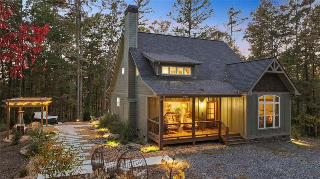 Exterior details and patio area of a home in , Ellijay (Image 24).