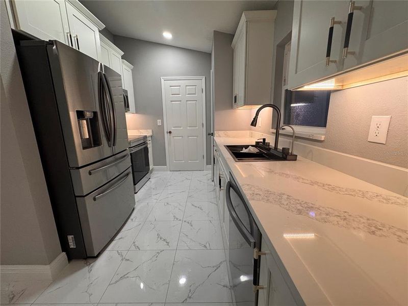 Furnished interior view inside a new home in , Dunnellon (Image 4).