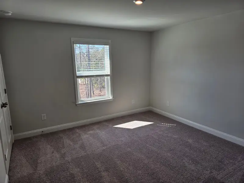 Spacious, unfurnished interior of a new home in Solserra, Shallotte (Image 8).