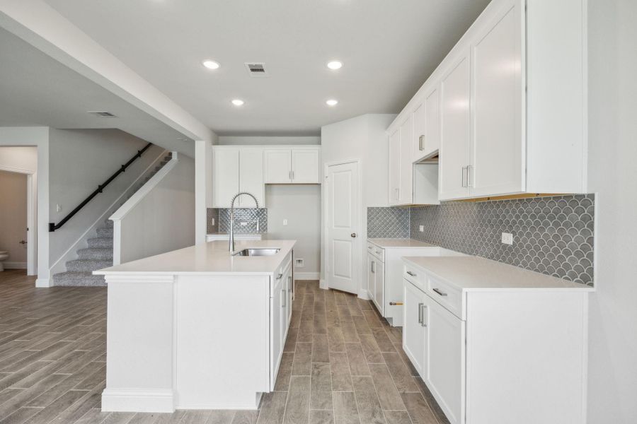 Furnished interior view inside a new home in Saint Tropez, Huffman (Image 7).
