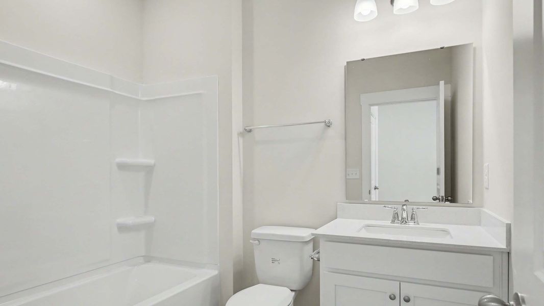 Representative furnished interior of a home built from the Calvert by D.R. Horton in Chapman Village, Conway (Image 7).