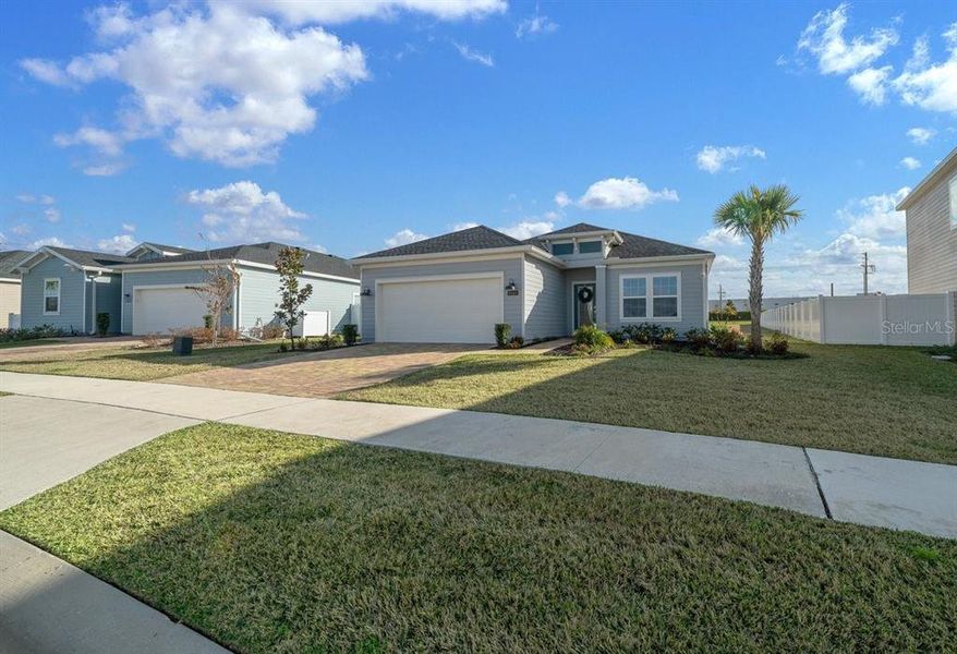 Front exterior of a new home in , Ocala, FL, highlighting curb appeal (Image 22).
