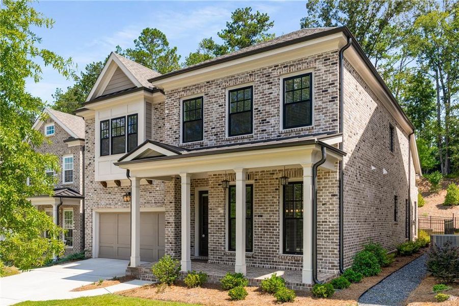 Front exterior of a new home in , Johns Creek, GA, highlighting curb appeal (Image 22). Front exterior of a new home in , Johns Creek, GA, highlighting curb appeal (Image 22).