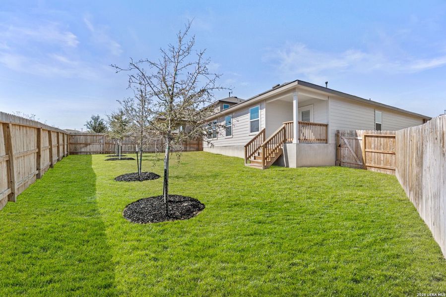 Exterior details and patio area of a home in Redbird Ranch, San Antonio (Image 2).
