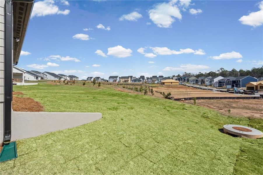 Exterior details and patio area of a home in Twin Lakes, Hoschton (Image 30).