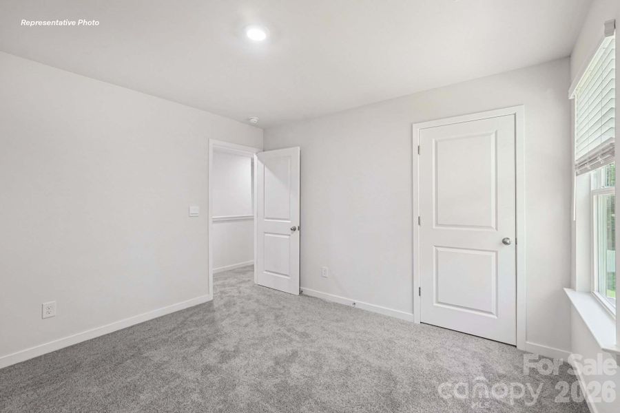 Spacious, unfurnished interior of a new home in Reedy Creek Preserve, Charlotte (Image 17).