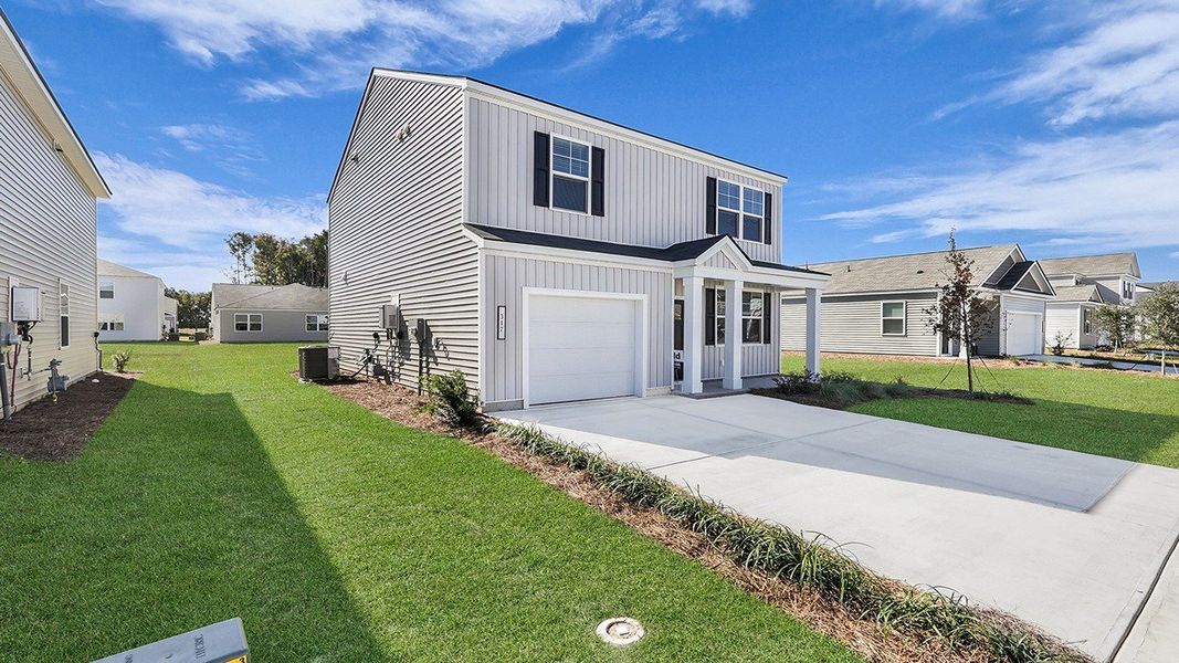 Exterior details and patio area of a home in Carolina Groves, Moncks Corner (Image 2). Exterior details and patio area of a home in Carolina Groves, Moncks Corner (Image 2).
