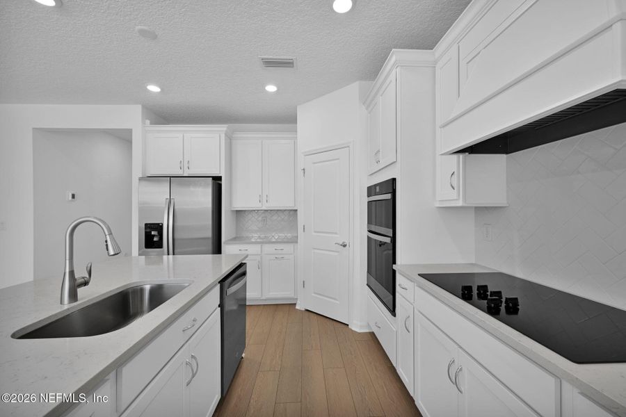 Furnished interior view inside a new home in Hyland Trail, Green Cove Springs (Image 5).