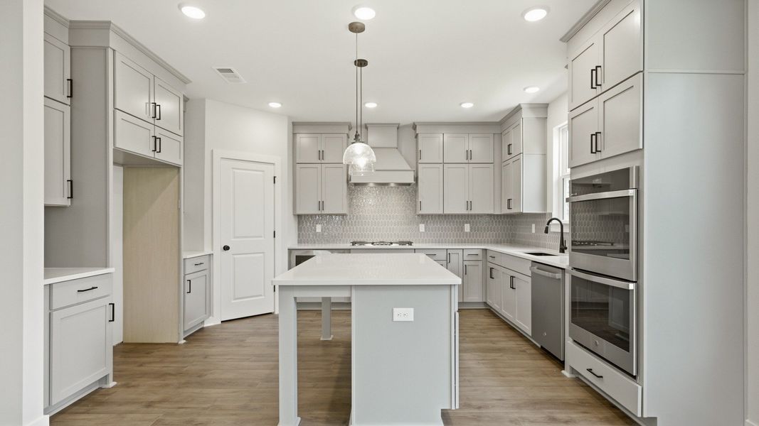 Ceiling height cabinet upgrade, quartz countertops, and ceramic tile backsplash Ceiling height cabinet upgrade, quartz countertops, and ceramic tile backsplash