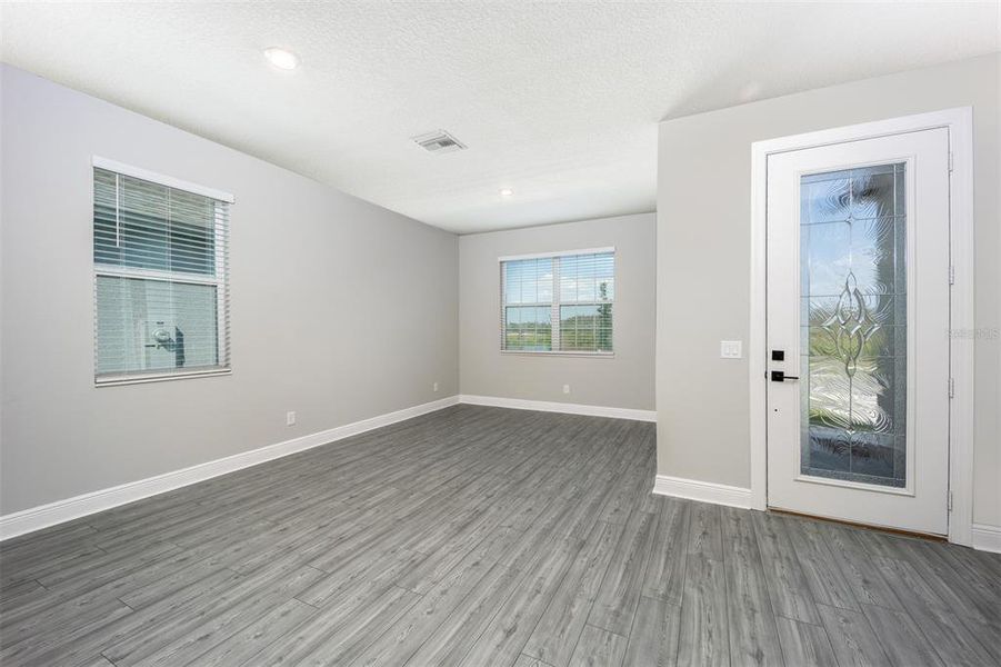 Spacious, unfurnished interior of a new home in Gum Lake Preserve, Lake Alfred (Image 13).