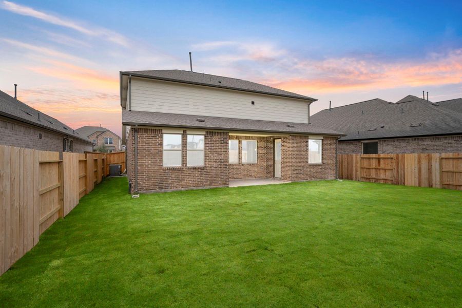 Exterior details and patio area of a home in Brookewater, Rosenberg (Image 3).
