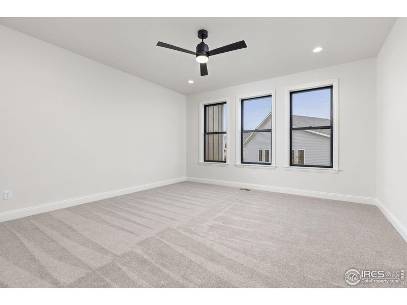 Spacious, unfurnished interior of a new home in Cottages at Kelly Farm, Greeley (Image 19).