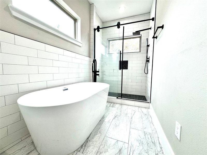 Primary bathroom with soaking tub.