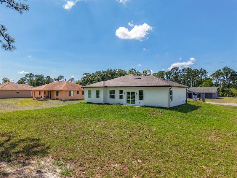 Exterior details and patio area of a home in , Lehigh Acres (Image 4).