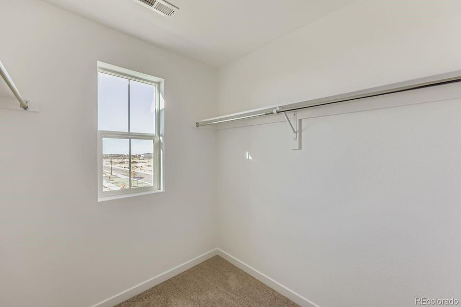 Spacious, unfurnished interior of a new home in Percheron: The Explorer Collection, Colorado Springs (Image 11).