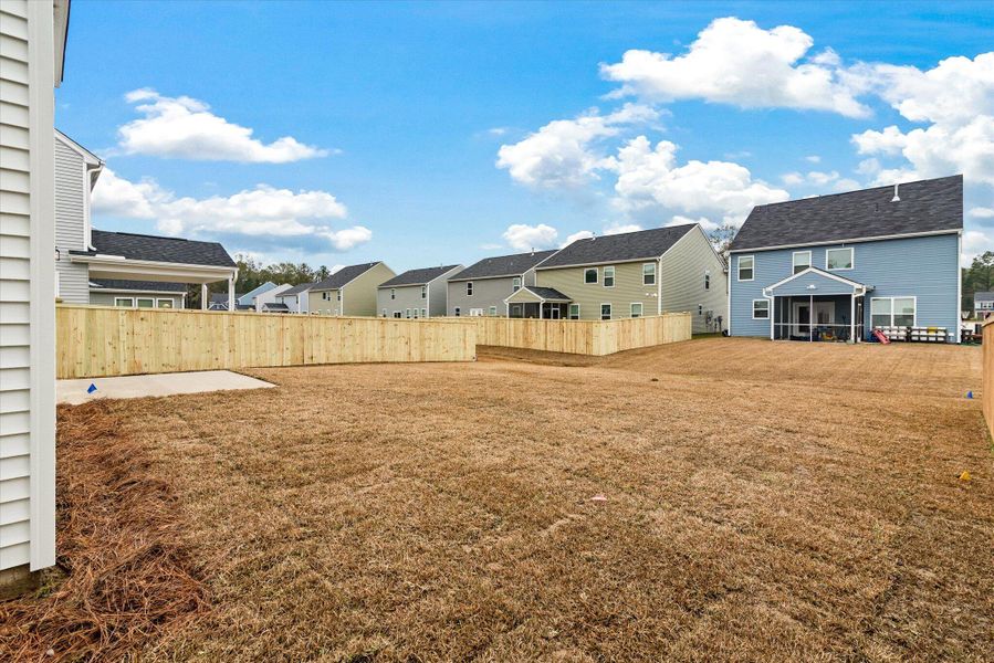 Exterior details and patio area of a home in Oakley Pointe, Moncks Corner (Image 22). Exterior details and patio area of a home in Oakley Pointe, Moncks Corner (Image 22).