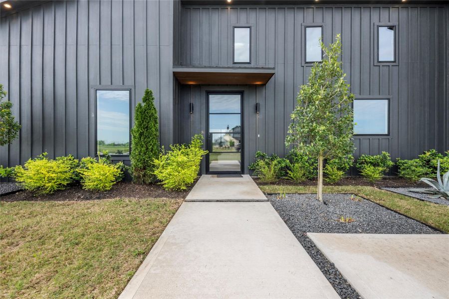 Exterior details and patio area of a home in , Sealy (Image 25).