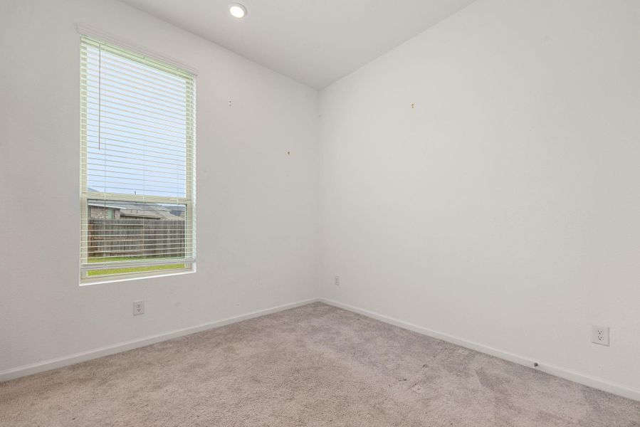 Second bedroom down with ensuite bath