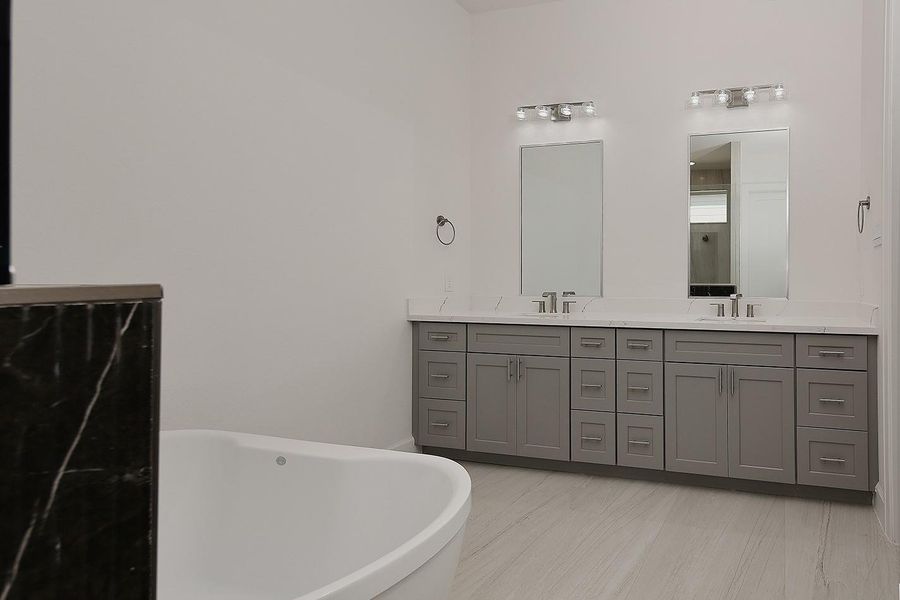 Furnished interior view inside a new home in Lake Breeze, Willis (Image 17).