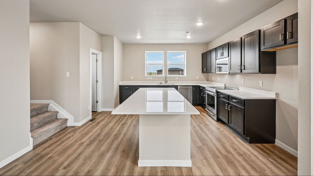 Furnished interior view inside a new home in Windler Townhomes, Aurora (Image 14). Furnished interior view inside a new home in Windler Townhomes, Aurora (Image 14).