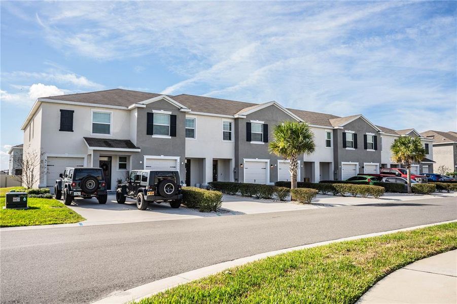 Front exterior of a new home in , Plant City, FL, highlighting curb appeal (Image 25).